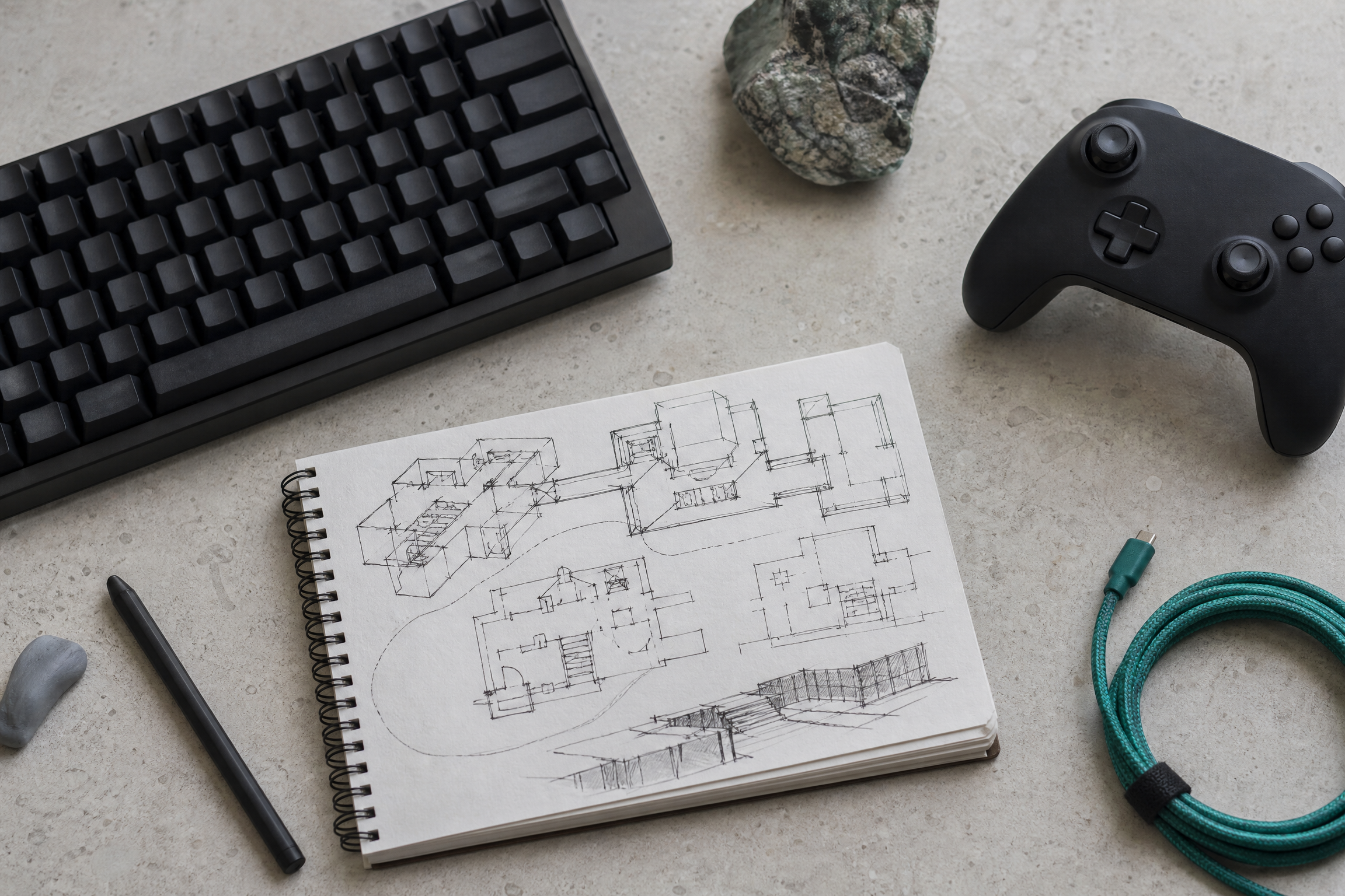 Game development tools arranged on a studio desk