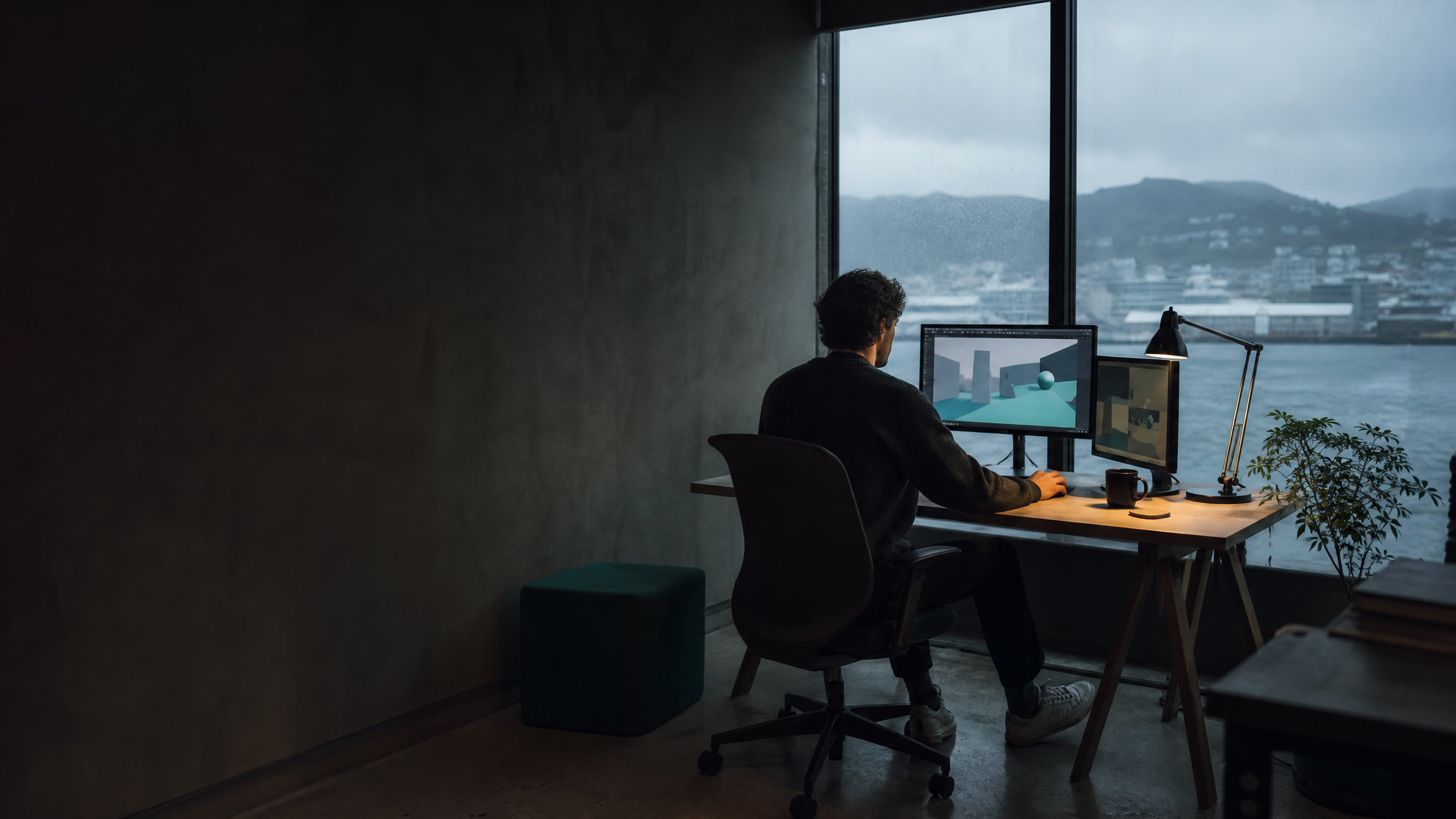 Independent game developer working at a Wellington studio desk